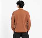 Plain back view of rust long-sleeve T-shirt